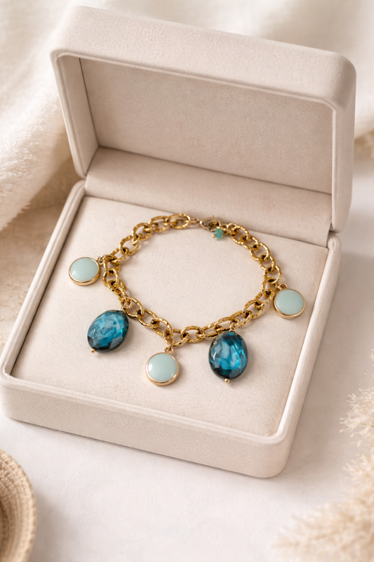 Bracelet NEPTUNE doré acier inoxydable avec pierres bleues et perles