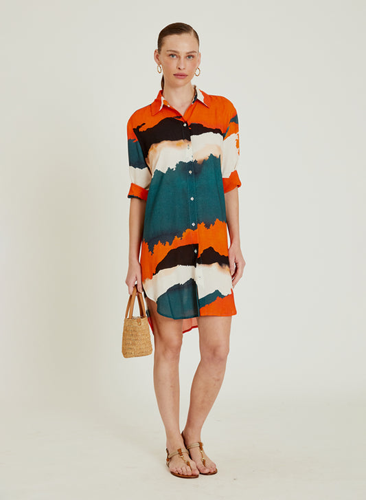 Robe chemise Horizon Lenny Niemeyer avec imprimé rayé orange, rouille et bleu pétrole, manches 3/4, boutonnage devant et longueur mi-cuisse