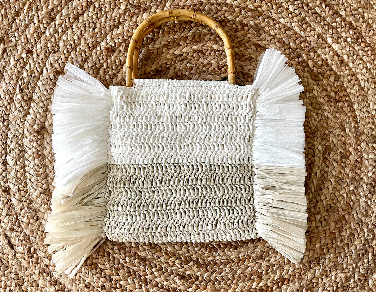 Square raffia fringe pouch with bamboo handles