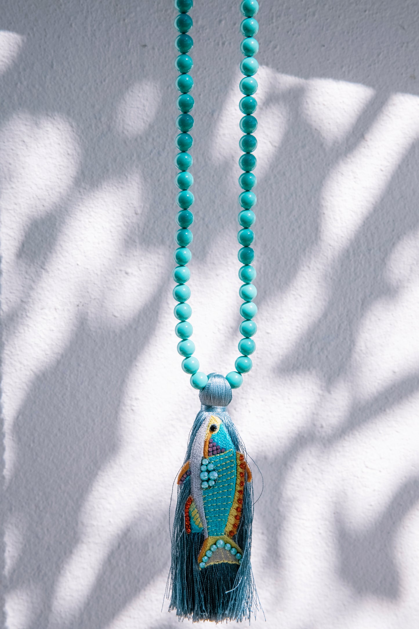 Rosario fish long necklace
